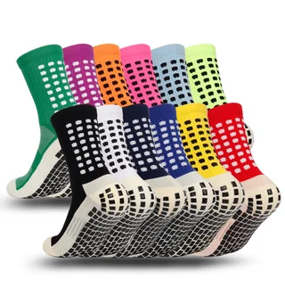 Twelve football grip sock color references arranged to show ribbed shafts and black sole pads