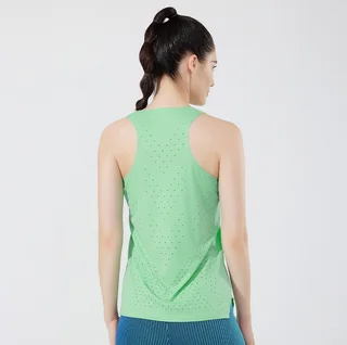 Back view of a light-green running singlet on a female model, showing the racerback cut and perforated ventilation